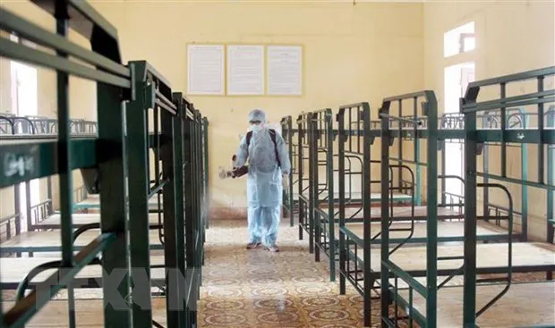 Spraying disinfectant at Regiment 123, which will receive and isolate those entering Vietnam (Source: VNA)