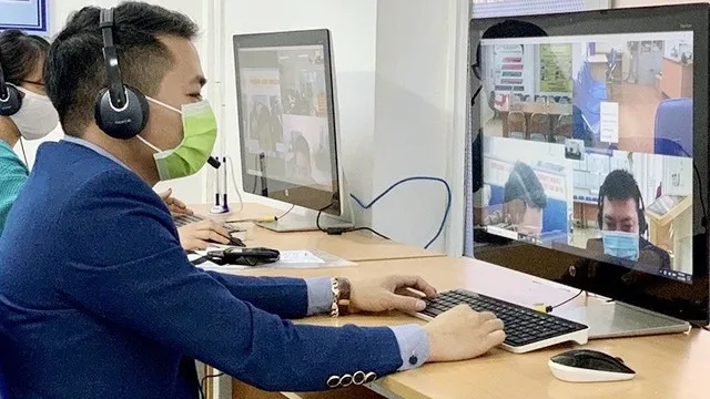 Employees finding jobs through a job transaction floor at the Hanoi Job Service Centre.