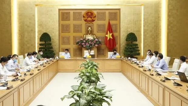 At the meeting (Photo: VNA)