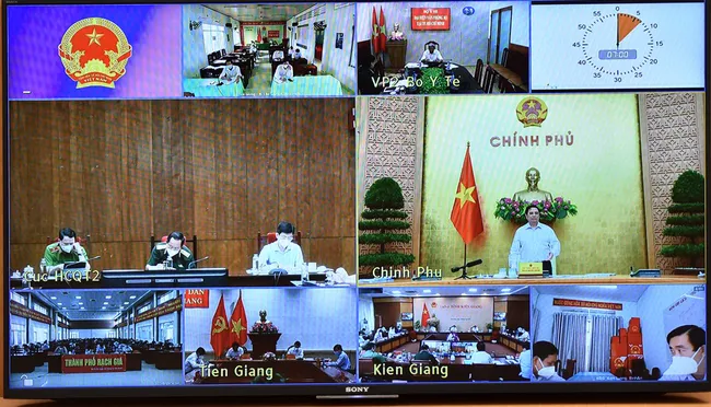 The virtual meeting between PM Pham Minh Chinh and the two provinces of Kien Giang and Tien Giang (Photo: VGP)