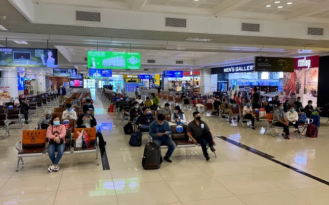 Airline passengers waiting for check-in.