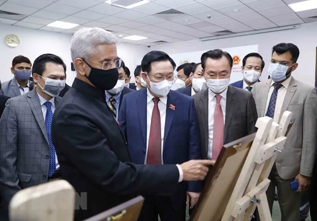 National Assembly Chairman Vuong Dinh Hue (centre, first row) at the exhibition (Photo: VNA)
