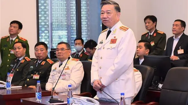 Minister of Public Security To Lam (standing) speaks at the inspection session. (Photo: VNA)