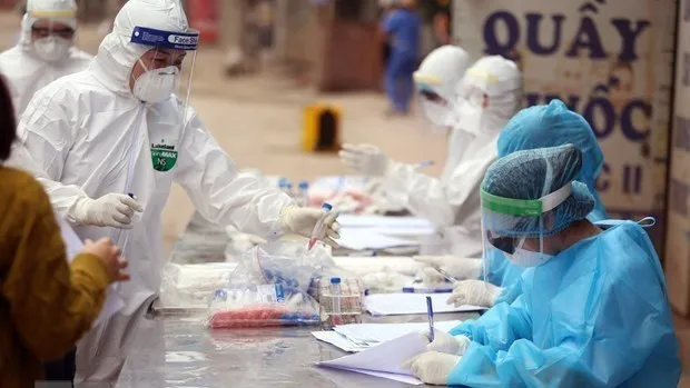 Samples taken for COVID-19 testing (Photo: VNA)