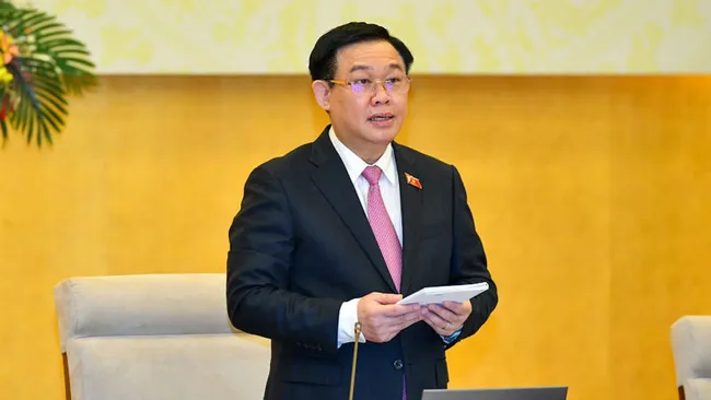 NA Chairman and Chairman of the National Election Council (NEC) Vuong Dinh Hue speaking at the conference