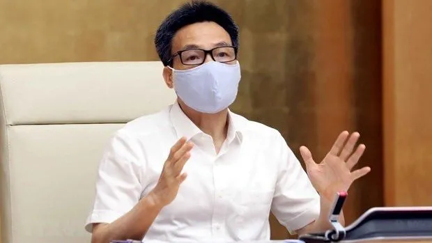 Deputy Prime Minister Vu Duc Dam speaks at a meeting of the National Steering Committee for COVID-19 Prevention and Control on May 21. (Photo: VNA)