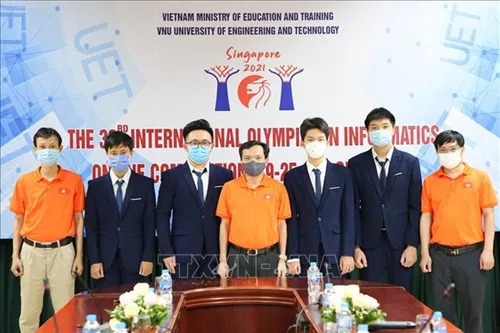Vietnamese students (in suits) win silver medals at International informatics Olympiad.
