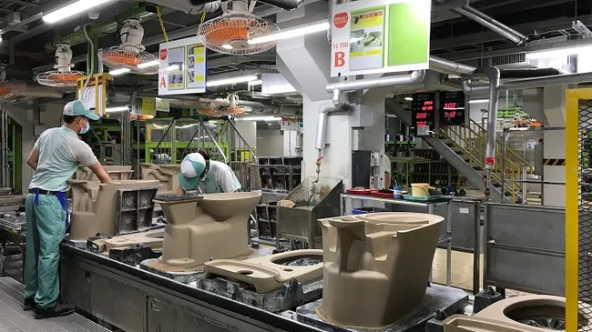 Workers at TOTO Vietnam Co., Ltd., at Thang Long II Industrial Park in Hung Yen.