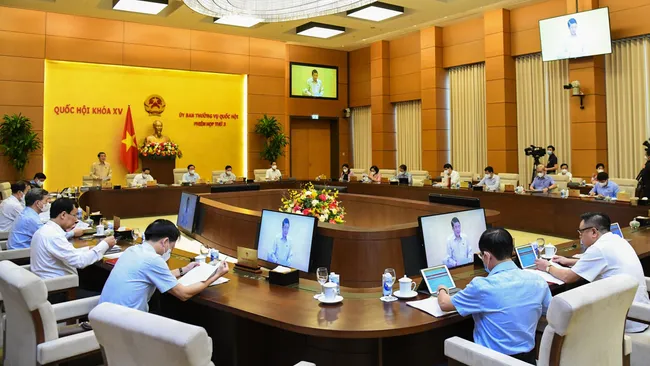 At the meeting to discuss the 2021 performance report and the 2022 audit plan of the State Audit Office of Vietnam. (Photo: quochoi.vn)