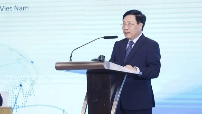 Deputy Prime Minister Pham Binh Minh speaks at the forum. (Photo: VNA)