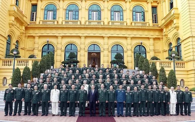 President Nguyen Xuan Phuc speaks at the meeting with the liaison board of the war veterans’ association of Division 341 on December 12. (Photo: VNA)