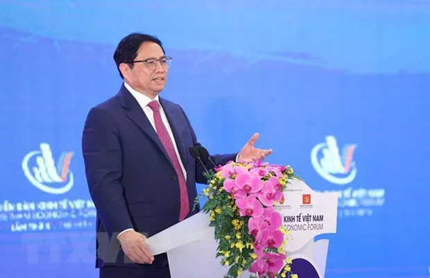 Prime Minister Pham Minh Chinh addresses the forum. (Photo: VNA)
