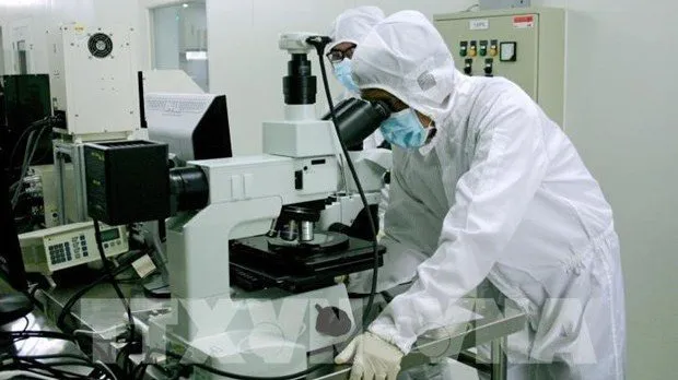 At a semiconductor technology research lab in HCM City (Photo: VNA)