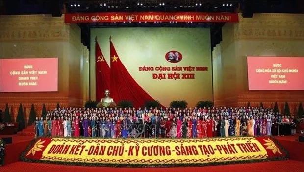 Female delegates to the 13th National Party Congress in early 2021 pose for a group photo (Photo: VNA)