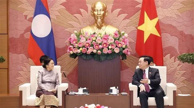 National Assembly Chairman Vuong Dinh Hue on April 26 hosted a reception for Vice President of Laos Pany Yathotou. (Photo: VNA)