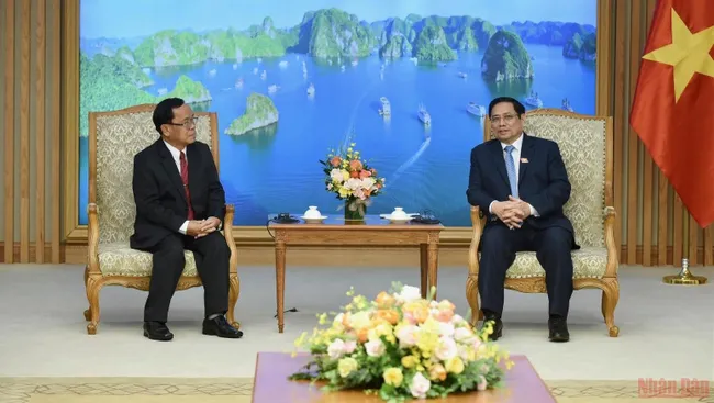 PM Pham Minh Chinh receives Lao State Inspection Authority Khamphan Phommaphat. (Photo: Tran Hai)
