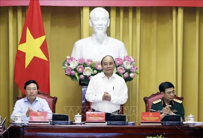 President Nguyen Xuan Phuc speaking at the meeting (Photo: VNA)