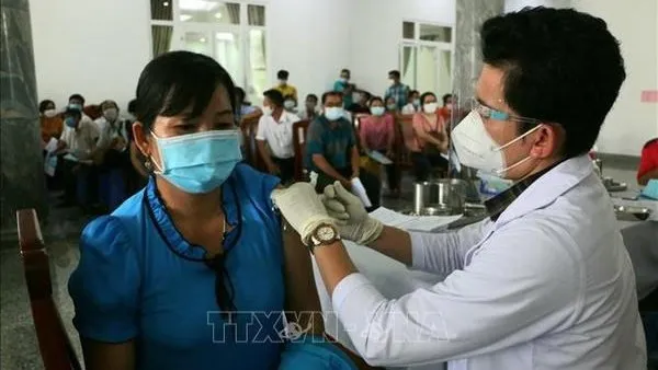 More than 235.18 million doses of COVID-19 vaccines have been administered in Vietnam so far. (Photo: VNA)