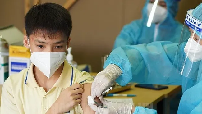 A man is vaccinated against COVID-19.