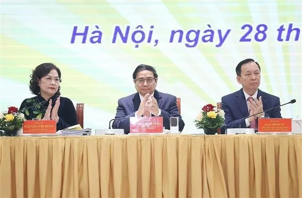 Prime Minister Pham Minh Chinh at the conference held by the central bank. (Photo: VNA)
