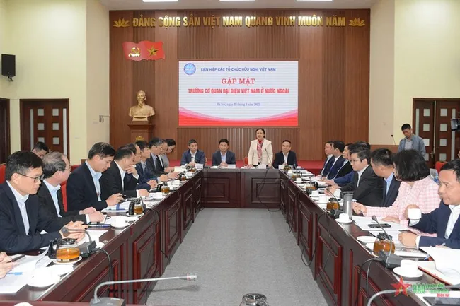 At the meeting (Photo: qdnd.vn)