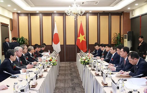 Prime Minister Pham Minh Chinh receives a visiting delegation of Japanese economic organisations. (Photo: VNA)
