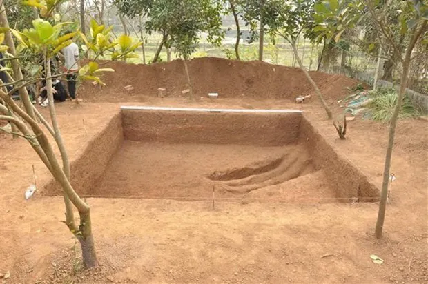 An excavation site on Dong Dau hill (Photo: VNA)