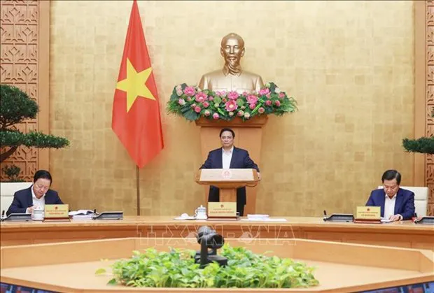 Prime Minister Pham Minh Chinh speaks at the event. (Photo: VNA)