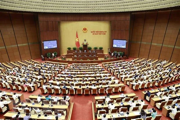 Lawmakers continue to evaluate the implementation of socio-economic development plans on June 1. (Photo: VNA)