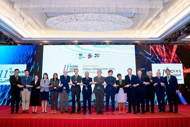 Delegates pose for a group photo at the dialogue