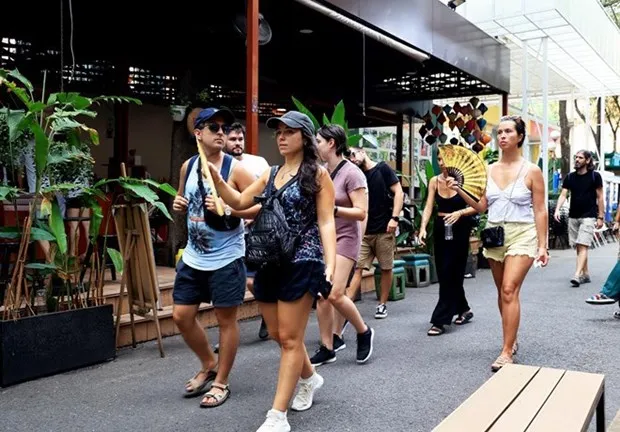 Spanish tourists visit Book Street in Ho Chi Minh City (Photo: VNA)