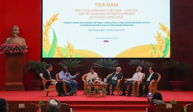 Speakers at a discussion during the workshop (Photo: VNA)