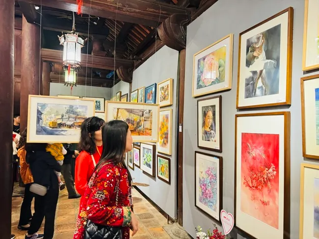 Watercolour paintings on display at the exhibition.