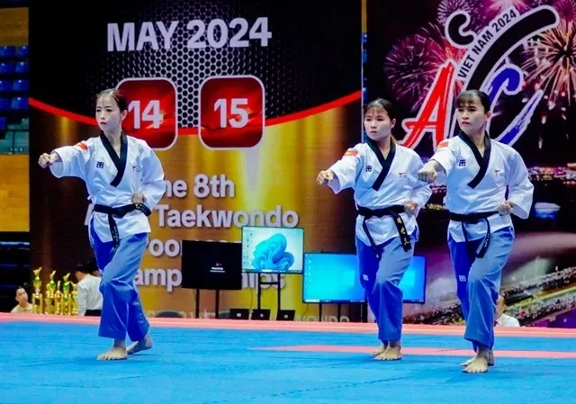 Chau Tuyet Van, Lien Thi Tuyet Mai and Nguyen Thi Le Kim (from left to right) top the podium of the 2024 Asian Taekwondo Championship's women's team T30 recognised poomsae category. (Photo courtesy of Taekwondo Vietnam)