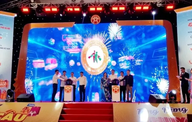 Delegates launch the programme in Hanoi. (Photo: NDO)