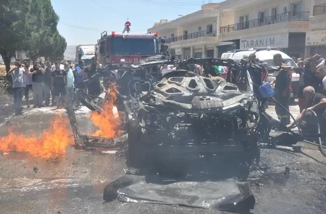 A vehicle destroyed by an Israeli airstrike in Al-Khyara, Lebanon on June 22 .(Photo: XINHUA/VNA)