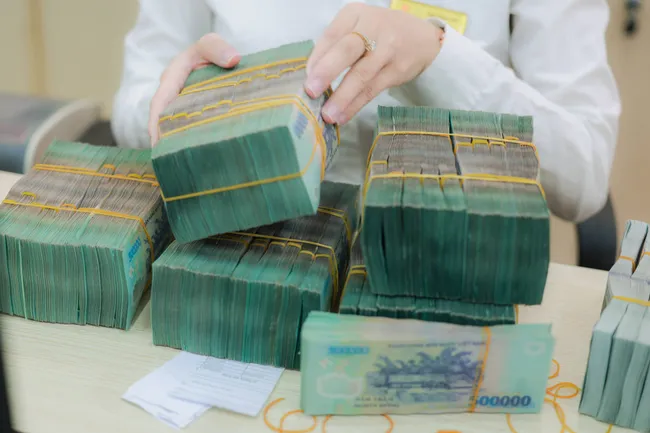 Market-wide revenue and post-tax profit rose by approximately 20.1% and 50.8% year-on-year respectively. (Photo: VNA)