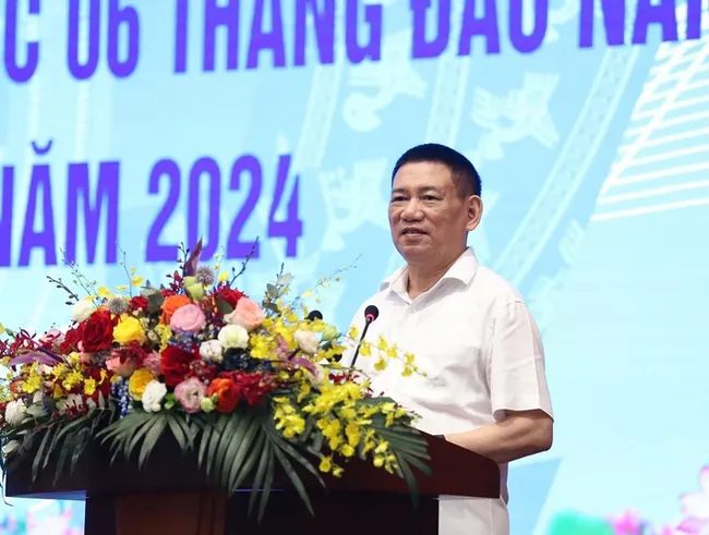 Minister of Finance Ho Duc Phoc speaking at the meeting (Photo: tapchitaichinh.vn)