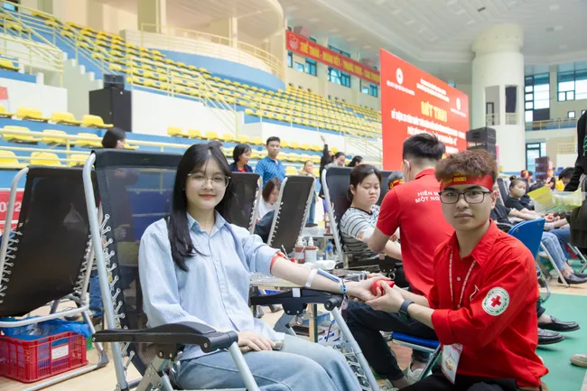 People donate blood at the National Institute of Haematology and Blood Transfusion in response to the 