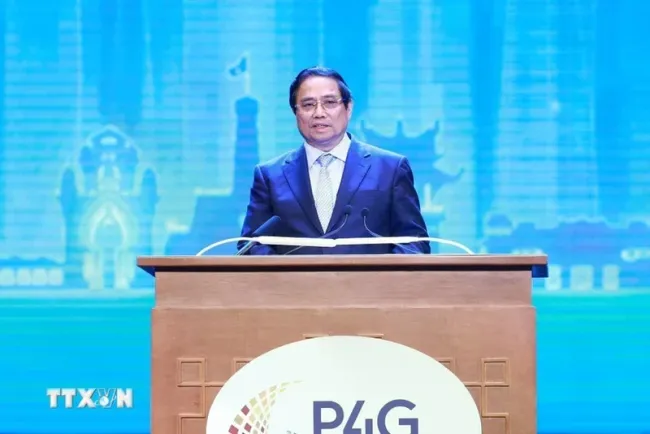 PM Pham Minh Chinh speaks at the opening of the P4G Summit in Hanoi on April 16. (Photo: VNA)