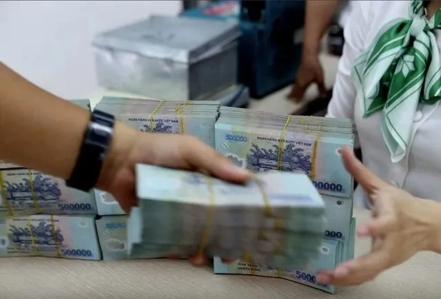 As of the end of March, nearly two million households and individual business owners nationwide were still paying taxes under the lump-sum method. (Photo: VNA)