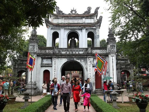 Tourists at the Temple of Literature complex - a key destination in Hanoi (Photo: VNA)