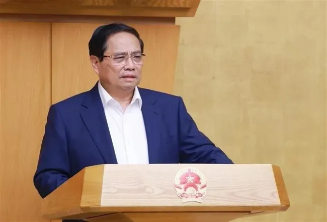 Prime Minister Pham Minh Chinh addresses the meeting on May 22. (Photo: VNA)