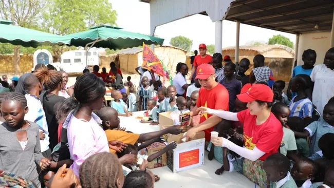The Vietnamese Blue Berets have prepared hundreds of gifts, including candy, toys, books, crayons, etc., to present to the children.