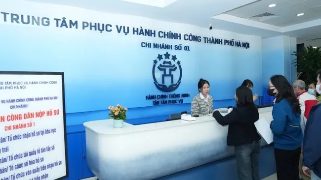 Citizens carry out administrative procedures at Ha Noi Public Administrative Service Centre.