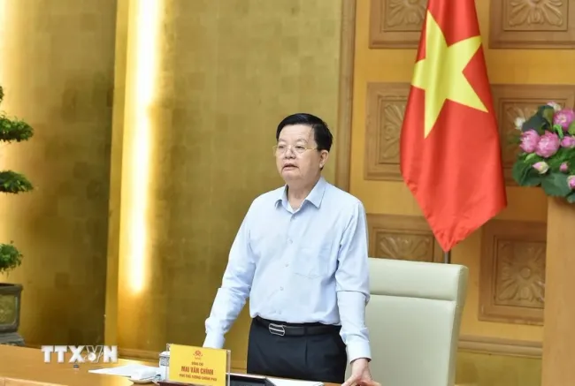 Deputy Prime Minister Mai Van Chinh, head of the steering committee for the national exhibition marking the 80th anniversary of Viet Nam’s National Day, speaks at the hybrid meeting with relevant ministries, agencies, and provincial authorities on July 25. (Photo: VNA)