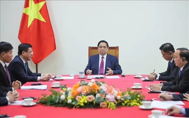 Vietnamese Prime Minister Pham Minh Chinh holds phone talks with his Cambodian counterpart Hun Manet on August 15 afternoon. (Photo: VNA)