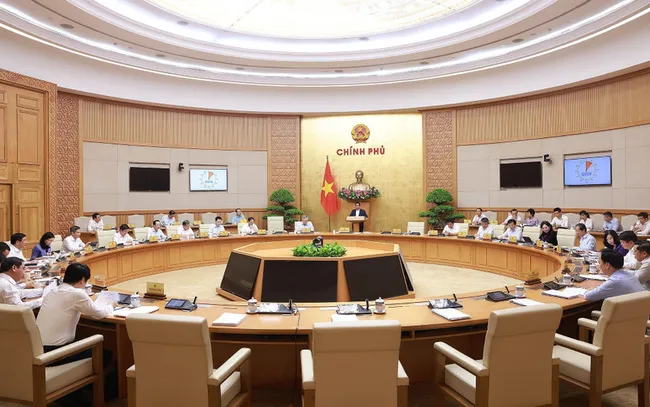 Prime Minister Pham Minh Chinh chairs the monthly Government law-making session on July 23. (Photo: VNA)