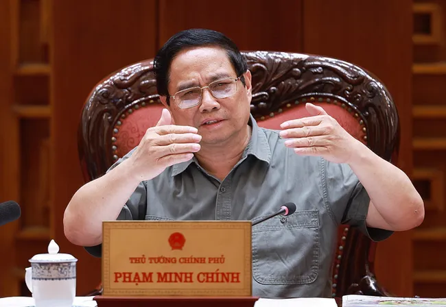Prime Minister Pham Minh Chinh speaks at the meeting (Photo: VNA)