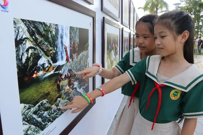 Visitors at the photo exhibition 
